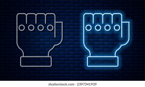 Glowing neon line MMA glove icon isolated on brick wall background. Sports accessory fighters. Warrior gloves.  Vector