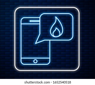 Glowing neon line Mobile phone with emergency call 911 icon isolated on brick wall background. Police, ambulance, fire department, call, phone.  Vector Illustration