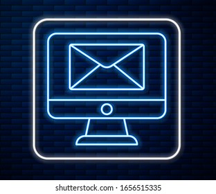 Glowing neon line Monitor and envelope, new message, mail icon isolated on brick wall background. Usage for e-mail newsletters, headers, blog posts.  Vector Illustration