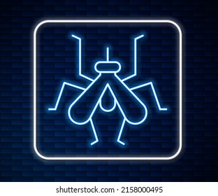 Glowing neon line Mosquito icon isolated on brick wall background.  Vector