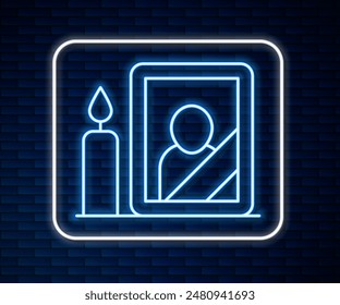 Glowing neon line Mourning photo frame with black ribbon icon isolated on brick wall background. Funeral ceremony and condolence card layout.  Vector