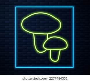 Glowing neon line Mushroom icon isolated on brick wall background.  Vector