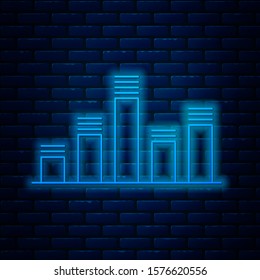 Glowing neon line Music equalizer icon isolated on brick wall background. Sound wave. Audio digital equalizer technology, console panel, pulse musical.  Vector Illustration