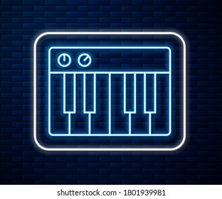 Glowing neon line Music synthesizer icon isolated on brick wall background. Electronic piano.  Vector Illustration