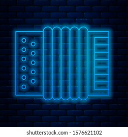 Glowing neon line Musical instrument accordion icon isolated on brick wall background. Classical bayan, harmonic.  Vector Illustration