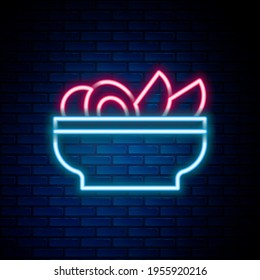 Glowing neon line Nachos in plate icon isolated on brick wall background. Tortilla chips or nachos tortillas. Traditional mexican fast food menu. Colorful outline concept. Vector