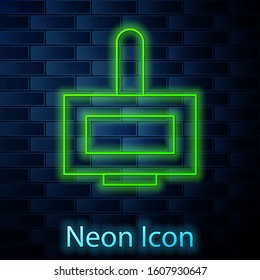 Glowing neon line Nail polish bottle icon isolated on brick wall background.  Vector Illustration