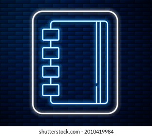 Glühende Neonline-Notebook-Symbol einzeln auf Backsteinwand-Hintergrund. Spiral Notizblock Symbol. Schulheft. Schreibpad. Tagebuch für die Schule.  Vektorgrafik