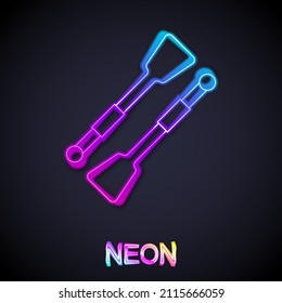 Glowing neon line Oars or paddles boat icon isolated on black background.  Vector