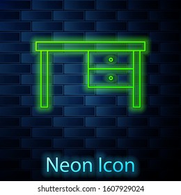 Glowing neon line Office desk icon isolated on brick wall background.  Vector Illustration