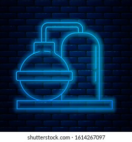 Glowing neon line Oil and gas industrial factory building icon isolated on brick wall background.  Vector Illustration