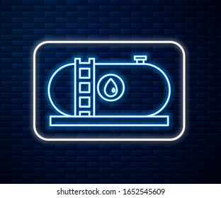 Glowing neon line Oil and gas industrial factory building icon isolated on brick wall background.  Vector Illustration