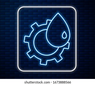 Glowing neon line Oil and gas industrial factory building icon isolated on brick wall background.  Vector Illustration