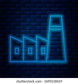 Glowing neon line Oil and gas industrial factory building icon isolated on brick wall background.  Vector Illustration
