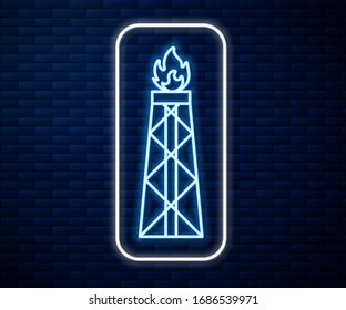 Glowing neon line Oil rig with fire icon isolated on brick wall background. Gas tower. Industrial object.  Vector Illustration