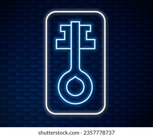Glowing neon line Old magic key icon isolated on brick wall background.  Vector