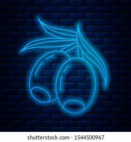 Glowing neon line Olives branch icon isolated on brick wall background.  Vector Illustration