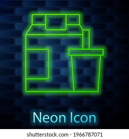 Glowing neon line Online ordering and fast food delivery icon isolated on brick wall background.  Vector
