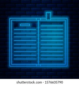 Glowing neon line Open science book icon isolated on brick wall background.  Vector Illustration