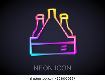 Glowing neon line Pack of beer bottles icon isolated on black background. Case crate beer box sign.  Vector