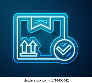 Glowing neon line Package box with check mark icon isolated on blue background. Parcel box. Approved delivery or successful package receipt.  Vector Illustration