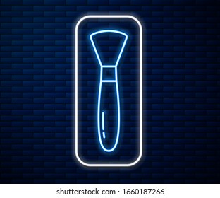 Icono de pincel de neón brillante aislado en fondo de pared de ladrillo. Ilustración vectorial