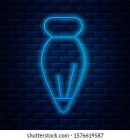 Glowing neon line Pastry bag for decorate cakes with cream icon isolated on brick wall background. Kitchenware and utensils.  Vector Illustration