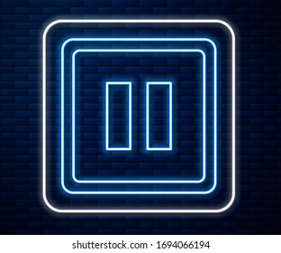 Glowing neon line Pause button icon isolated on brick wall background.  Vector Illustration