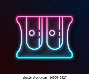 Glowing neon line Pencil sharpener icon isolated on black background.  Vector Illustration