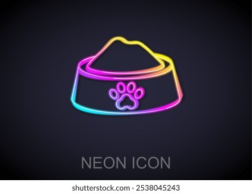 Glowing neon line Pet food bowl for cat or dog icon isolated on black background. Dog or cat paw print.  Vector