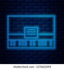 Glowing neon line Piano icon isolated on brick wall background. Musical instrument.  Vector Illustration