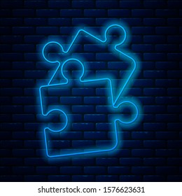Glowing neon line Piece of puzzle icon isolated on brick wall background. Business, marketing, finance, template, layout, infographics, internet concept.  Vector Illustration