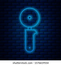 Glowing neon line Pizza knife icon isolated on brick wall background. Pizza cutter sign. Steel kitchenware equipment.  Vector Illustration
