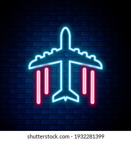 Glowing neon line Plane icon isolated on brick wall background. Flying airplane icon. Airliner sign. Colorful outline concept. Vector