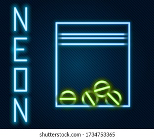Glowing neon line Plastic bag of drug icon isolated on black background. Health danger. Colorful outline concept. Vector Illustration