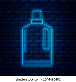 Glowing neon line Plastic bottle for liquid laundry detergent, bleach, dishwashing liquid or another cleaning agent icon isolated on brick wall background.  Vector Illustration