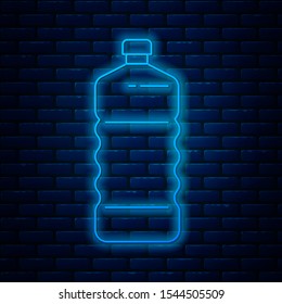 Glowing neon line Plastic bottle icon isolated on brick wall background.  Vector Illustration