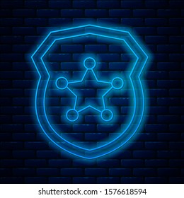 Glowing neon line Police badge icon isolated on brick wall background. Sheriff badge sign.  Vector Illustration