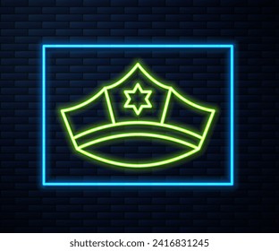 Glowing neon line Police cap with cockade icon isolated on brick wall background. Police hat sign.  Vector