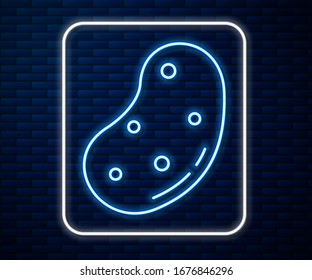 Glowing neon line Potato icon isolated on brick wall background.  Vector Illustration