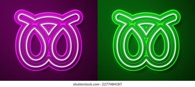 Glowing neon line Pretzel icon isolated on purple and green background. German comfort food pastry. Oktoberfest festival.  Vector