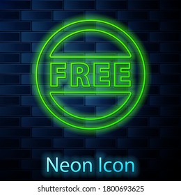 Glowing neon line Price tag with an inscription Free icon isolated on brick wall background. Badge for price. Promo tag discount. Vector Illustration