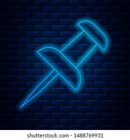 Glowing neon line Push pin icon isolated on brick wall background. Thumbtacks sign.  Vector Illustration