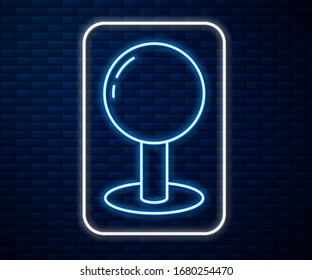 Glowing neon line Push pin icon isolated on brick wall background. Thumbtacks sign.  Vector Illustration