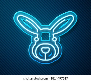 Glowing neon line Rabbit head icon isolated on blue background.  Vector