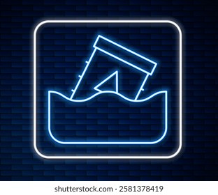 Glowing neon line Radioactive waste in barrel icon isolated on brick wall background. Toxic waste contamination on water. Environmental pollution.  Vector