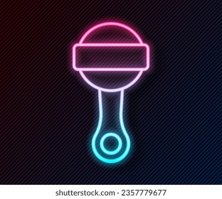 Glowing neon line Rattle baby toy icon isolated on black background. Beanbag sign.  Vector