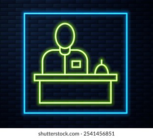 Glowing neon line Receptionist standing at hotel reception desk icon isolated on brick wall background.  Vector