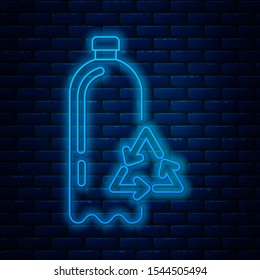 Glowing neon line Recycling plastic bottle icon isolated on brick wall background.  Vector Illustration