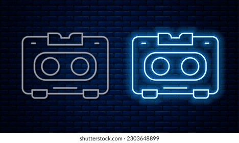 Glowing neon line Retro audio cassette tape icon isolated on brick wall background.  Vector